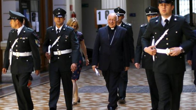 FILE PHOTO: Archbishop of Santiago, Ricardo Ezzati arrives at the supreme court building in Santiago city, Chile, November 5, 2015. REUTERS/Ivan Alvarado/file photo